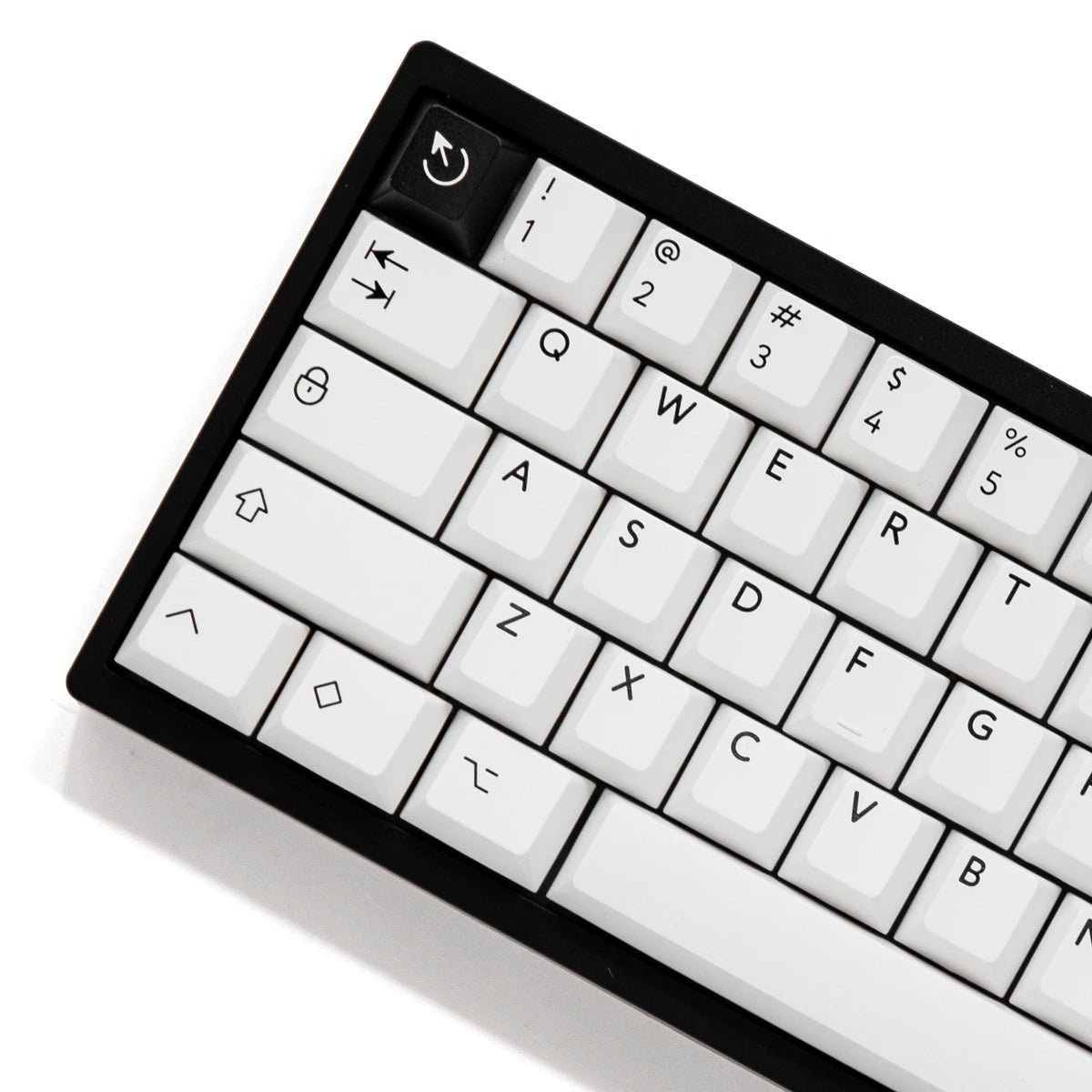 Angled close-up of PBTfans BOW Cherry profile keycaps