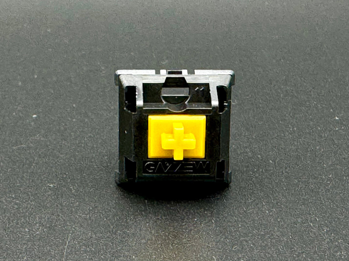Close-up of Gazzew Boba U4T tactile switch, clear housing with dark stem