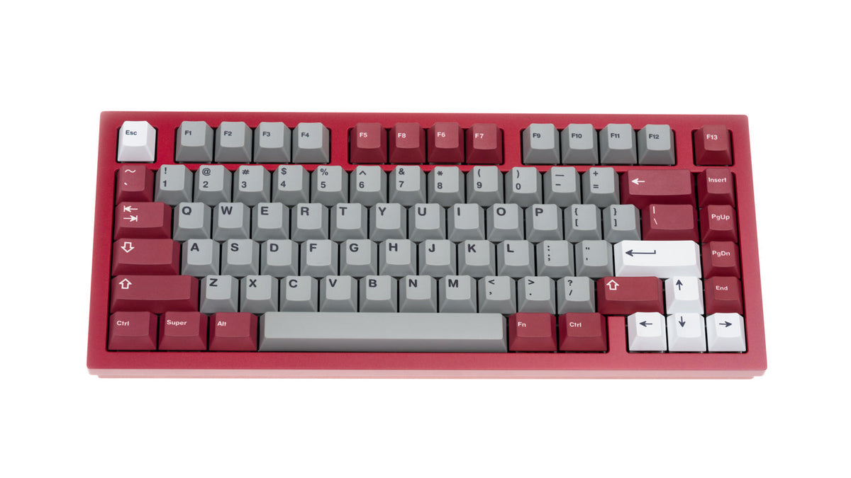NicePBT Grey Burgundy keycaps on red keyboard case, front view